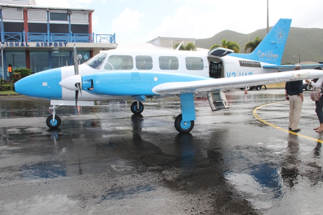 The Caribbean Helicopters Limited aircraft landing at the Vance W. Amory International Airport on February 20, 2015