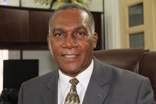 Premier of Nevis and Federal Minister of Labour, Social Security, Nevis Affairs and Ecclesiastical Affairs Hon. Vance Amory at his Bath Plain Office on March 25, 2015