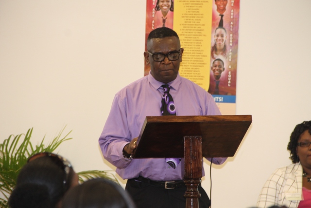 Secretary General for the SKN Commission for UNESCO Antonio Maynard delivering remarks at the UNESCO Youth for Human Rights Awareness Training for Trainers Workshop on March 4, 2015 at the Disaster Management Department’s Emergency Operation Center Conference Room