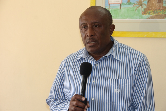 Acting Permanent Secretary of Tourism Mr. Carl Williams giving brief remarks at the Taxi Permit Handing over Ceremony at The Nevis Island Administration Building on March 11, 2015.
