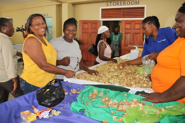 Members of staff at the Agriculture Department selling products at the George Mawbray Hanley Market Complex in Charlestown during the third Agriculture Awareness Month in 2014