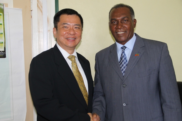 Premier of Nevis Hon Vance Amory (right) welcomes Resident Ambassador of the Republic of China (Taiwan) of St.Kitts and Nevis His Excellency George Gow Wei Chiou during a courtesy call on April 08, 2015, at the Nevis Island Administration building at Bath Plain