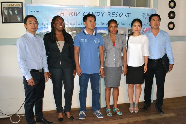 (L-R) Assistant General Manager of HTRIP Allen Huang, Local Business Manager of HTRIP Terrelah Byron, Chief Executive Officer and Director of HTRIP and 1st Director of Caribbean Development Consultant Ltd. Mr. Jian Li, Administrative Assistant of HTRIP Latoya Claxton, Client Services Manager of HTRIP Fiona Lei and General Manager of HTRIP David Liu at the HTRIP Press Conference at the Riviere House, Government Road Nevis on April 23, 2015