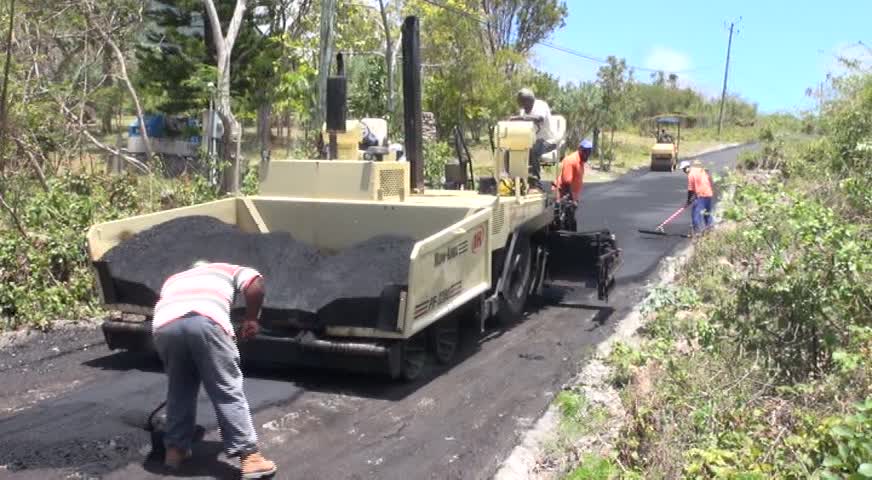 The Public Works Department doing finishing works on a road project which connects Lampa Hill to Bailey Yard, Cole Hill and Brown Hill