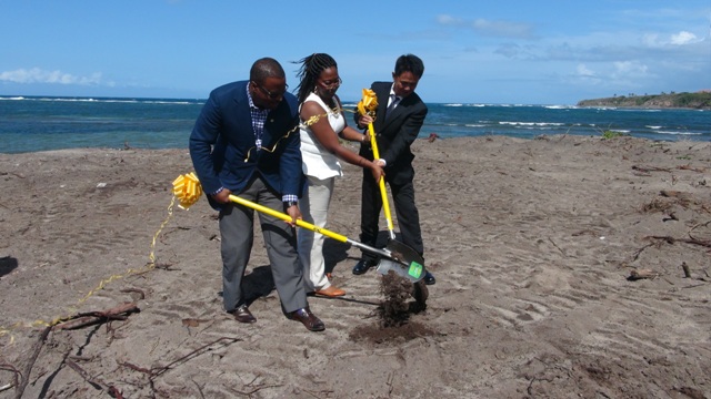 Deputy Premier of Nevis and Minister of Tourism Hon. Mark Brantley, Candy Resort’s Local Office Executive Terrehah Byron and Chief Executive Officer (CEO) and General Manager of HTRIP and 1st Director of Caribbean Development Consultant Ltd. (CDCL) Mr. Jian Li break ground for the US$20 million HTRIP Candy Resort Villa Development at Liburd Hill, St. James’ Parish on Nevis on April 17, 2015