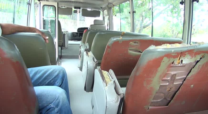 Back seat covering cut by students who use the Department of Education’s free School Bus Programme to and from school
