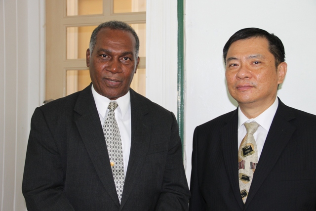 (l-r) Premier of Nevis Hon Vance Amory and Resident Ambassador of the Republic of China (Taiwan) to St. Kitts and Nevis His Excellency George Gow Wei Chiou during a courtesy call on July 14, 2015, at the Nevis Island Administration building at Bath Plain