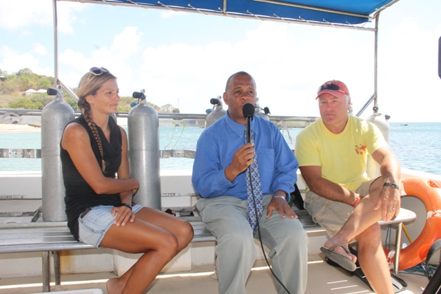 Scuba Safari’s Valerie Gregoire (left) and Reef Check Specialist James Hewlett (right) being interviewed by Permanent Secretary in the Ministry of Agriculture and Fisheries Eric Evelyn on June 25, 2015 for an upcoming NTV8 Eye on Agriculture programme