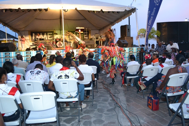Masquerades dancing at the launch of Culturama 41 on the Charlestown Waterfront on July 23, 2015
