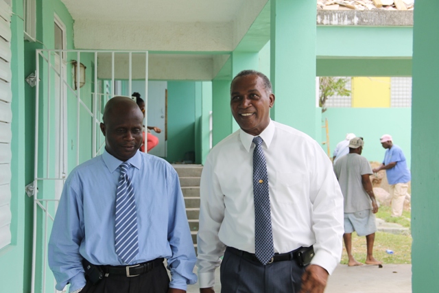 Premier of Nevis and Minister of Education Hon. Vance Amory accompanied by Permanent Secretary in the Premier’s Ministry Wakely Daniel touring the Charlestown Primary School on August 11, 2015 for a first-hand look of progress on the Schools Rehabilitation Project there