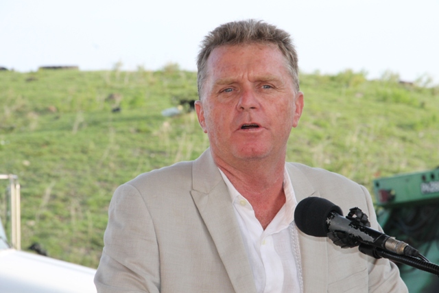 Steve Hammond, Caribbean Region Operation Manager for US-based Omni Global, at the ceremony handing over two state-of-the-art Kenworth garbage collection trucks at the Long Point landfill on September 17, 2015