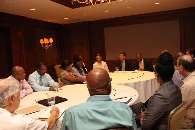 Representatives from the business sector on Nevis with Premier of Nevis and Minister of Finance Hon Vance Amory at a meeting with International Monetary Fund officials led by Deputy Managing Director of the International Monetary Fund Min Zhu at the Four Seasons Resort on September 02, 2015
