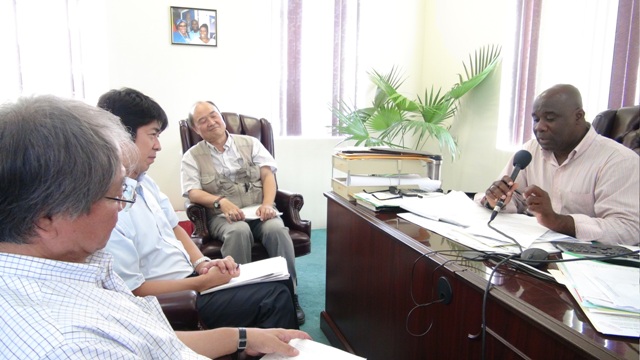 Fisheries Minister Hon. Alexis Jeffers welcomes team of Japan experts (l-r) Senior Advisor (Civil Engineering) Shinji Sakurai Advisor, Grant Aid Project Management Division 3, Financial Cooperation Implementation Department Hiroyuki Tanaka from the Japanese International Cooperation Agency and Senior General Manager and Senior Civil Engineer of ECHO Corporation Hitoshi Takemoto to his office on October 06, 2015