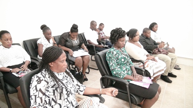 Immigration Officers on Nevis at a workshop with Senior Immigration Officer on Nevis Sergeant Paulette Bartlette (front row, extreme left) at the Cotton Ground Police Station on October 21, 2015