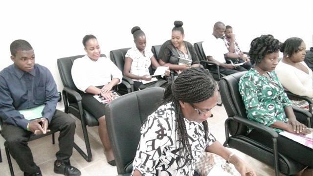 Immigration Officers on Nevis at a workshop with Senior Immigration Officer on Nevis Sergeant Paulette Bartlette (front row, extreme left) at the Cotton Ground Police Station on October 21, 2015