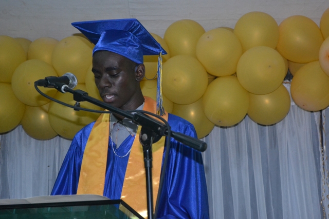 Chris-Andrew Smith, Valedictorian of the Charlestown Secondary School’s CCSLC Class of 2015, delivers his valedictory speech at the Graduation and Prize-giving Ceremony for the Charlestown Secondary School and the Nevis Sixth Form College at the Cicely Grell-Hull Dora Stevens Netball Complex on November 11, 2015