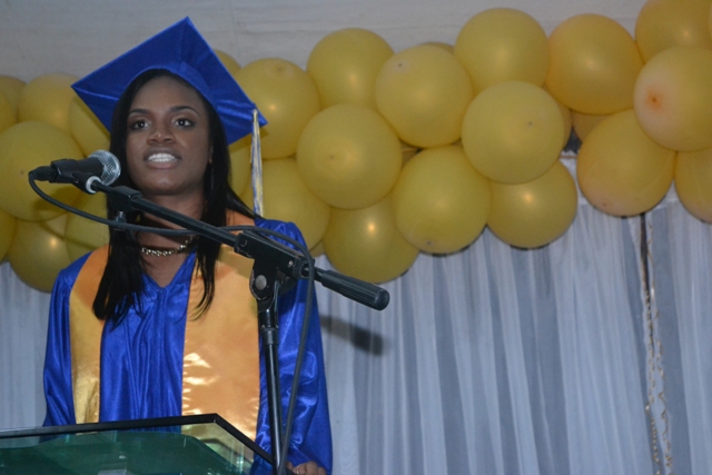Valedictorian of the Charlestown Secondary School’s (CSEC) graduating class of 2015 Nekhaila Tyson delivering here valedictory speech at the Graduation and Prize-giving Ceremony for the Class of 2015 at the Cicely Grell-Hull Dora Stevens Netball Complex on November 11, 2015