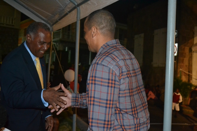 (L-R) Premier of Nevis Hon. Vance Amory congratulates Stephen Hanley Patron of the annual Christmas Tree Lighting Ceremony at the Memorial Square in Charlestown on December 02, 2015