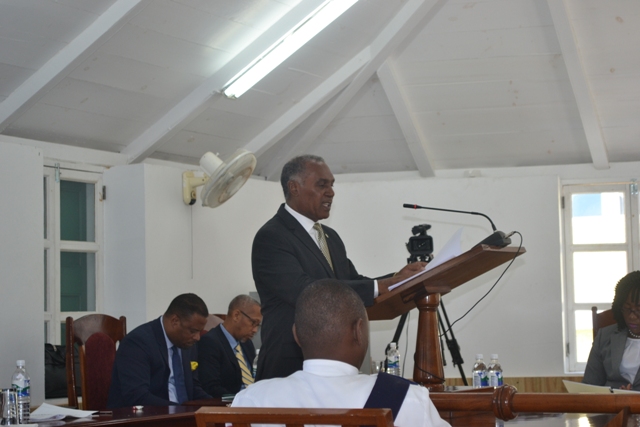 Premier of Nevis and Minister of Finance Hon. Vance Amory delivering the 2016 Budget Address at a sitting of the Nevis Island Assembly on December 08, 2015. In the background are (l-r) Deputy Premier of Nevis Hon. Mark Brantley and Legal Advisor to the Nevis Island Administration Collin Tyrell