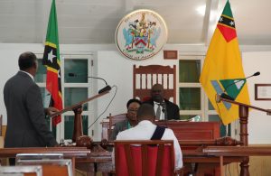 A sitting of the Nevis Island Assembly Chambers in session with Premier of Nevis Hon. Vance Amory addressing the Assembly’s President Hon. Farrel Smithen with Assembly Clerk Shemica Maloney and Sargent of Arms from the Royal St. Christopher and Nevis Police Force in attendance (file photo)