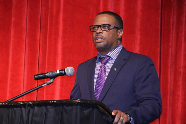 Deputy Premier of Nevis and Minister of Tourism in the Nevis Island Administration Hon. Mark Brantley, delivering welcome remarks at the 2016 Bank of Nevis Ltd. Tourism Youth Congress on May 19, 2016 at the Nevis Performing Arts Centre