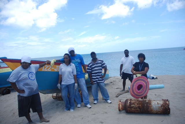 A team from the Fisheries Division moments after cleaning up the landing site at Jessups Bay on Community Outreach Day on May 11, 2016, an event in the Ministry of Agriculture’s Agriculture Awareness Month 2016