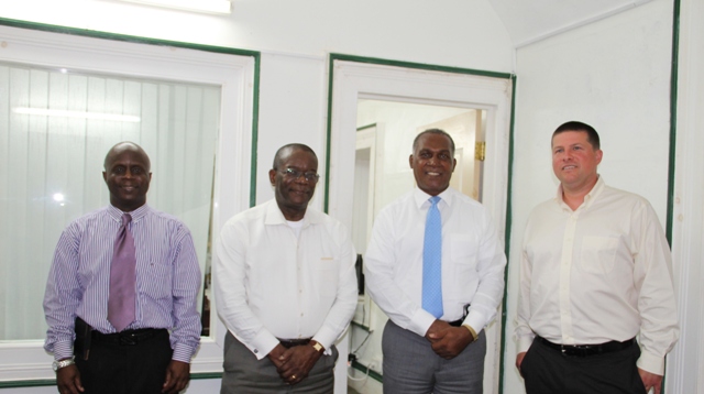 L-R) Permanent Secretary in the Premiers Ministry Mr. Wakely Daniel, St. Kitts and Nevis Ambassador to the Organisation of American States (OAS) His Excellency Dr. Everson Hull, Premier of Nevis and Minister of Education Hon. Vance Amory and Mr. Christian Goodwillie, Director and Curator of Special Collections and Archives at the Burke Library, Hamilton College in Clinton, New York, United States of America at Bath Hotel on June 20, 2016