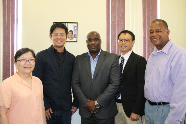 Hon. Alexis Jeffers, Minister of Agriculture in the Nevis Island Administration (center) and Permanent Secretary in the Ministry of Agriculture Eric Evelyn (extreme right) with Shih-Lung Cheng, Project Manager of the Vegetable, Fruit and Upland Crop Quality and Safety Improvement Project (second from right), Shih-Yu Chang of Eco Garden in the Republic of China (Taiwan) (second from left) and Yu-Wen Lin, Associate Researcher at the Soil Analysis Laboratory, Agricultural Chemistry Division at the Taiwan Agricultural Research Institute (extreme left) at the minister’s office at the Nevis Island Administration building in Charlestown on June 29, 2016