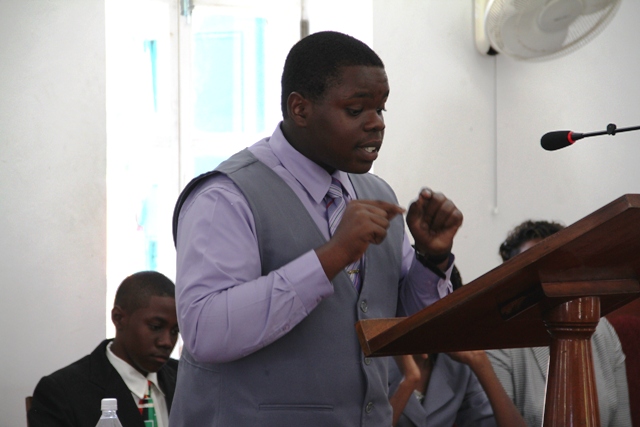 St. Kitts and Nevis top 2016 Caribbean Secondary Education Certificate examinations student Rol-J Williams, making a presentation at a sitting of the Youth Parliament at the Nevis Island Assembly in 2014