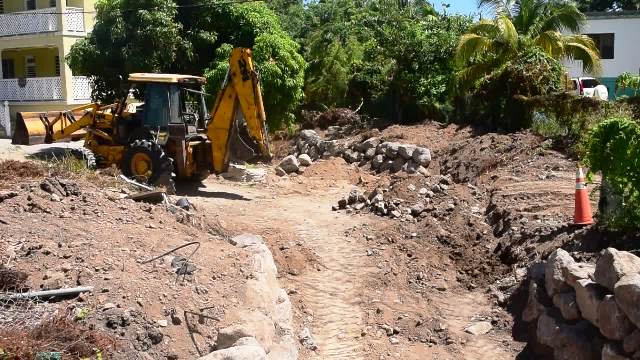 Ongoing improvement work by local contractors on a bridge at Barnaby Village on August 23, 2016