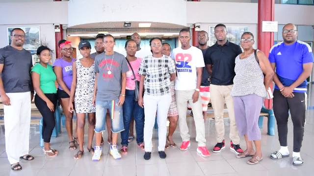 (Extreme left) Deputy Premier of Nevis and Minister of Sports Hon. Mark Brantley and Director of Sports Jamir Claxton (extreme right) with team of four and their family and wellwishers moments before their departure from the Vance W. Amory International Airport on September 03, 2016, to pursue sports studies in Jamaica