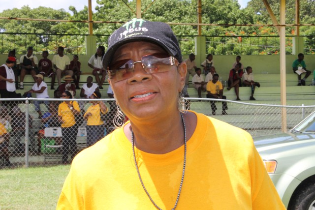 Mrs. Garcia Hendrickson, Coordinator of the Seniors Division in the Department of Social Services at the Elquemedo T. Willett Park at the end of the senior citizens march against ageism through Charlestown on October 07, 2016