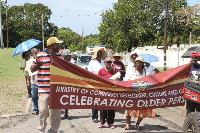 A contingent of senior citizens from St. Kitts marching against ageism in Charlestown with their Nevis counterparts on October 07, 2016, as part of the Month of Older Persons hosted by the Seniors Division in the Department of Social Services, Ministry of Social Development in the Nevis Island Administration