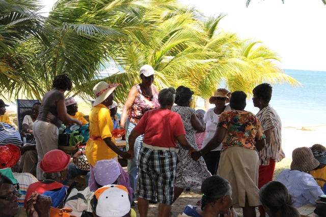 Seniors having fun at a picnic at Oualie Beach hosted by the Seniors Division in the Department of Social Services, Ministry of Social Development in the Nevis Island Administration