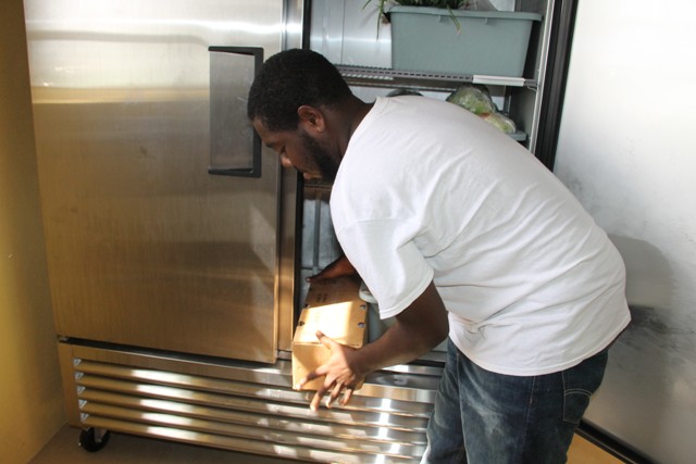 Shavon Lawrence, first head cook at the new Joycelyn Liburd Primary School cafeteria preparing ingredients on September 30, 2016, ahead of his first official day on October 03, 2016