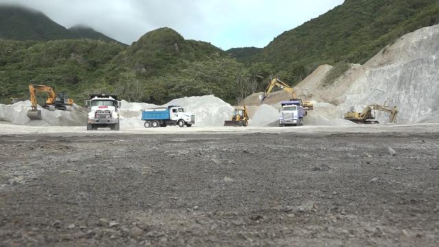 Local truckers at the quarry at New River on February 28, 2017, fill up with aggregate at the, bound for the Long Point Port for shipment to St. Maarten