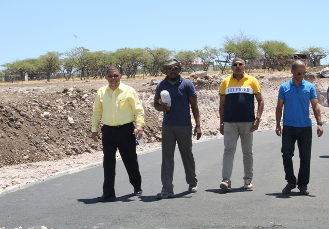 Management of Gulf Insurance Limited touring the MUNDO athletic track under construction at Long Point on April 06, 2017. (L-r) John Barkely, Gulf Insurance Limited’s Operations/Claims Manager, Project Manager Timothy Caines, S. Nandpersad, Director of Assuria Group, Gulf’s parent company based in Suriname and Jason Clarke, Managing Director of Gulf Insurance Limited 