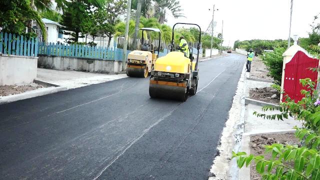 A section of the 2,400 feet of road being asphalted by workmen from the Public Works Department on Nevis on June 14, 2017  