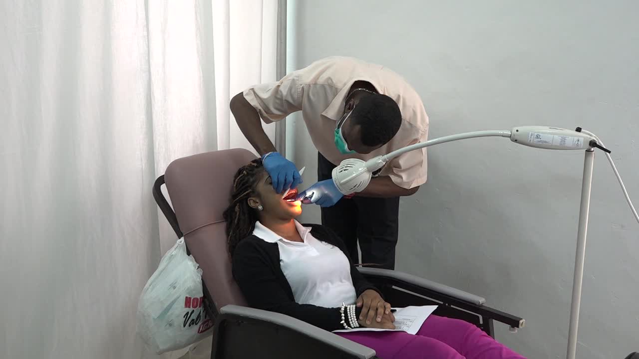 A dental screening for an attendee at the Barrels For Chance Inc. Health Fair at the St. Paul’s Anglican Church Hall in Charlestown on July 28, 2017