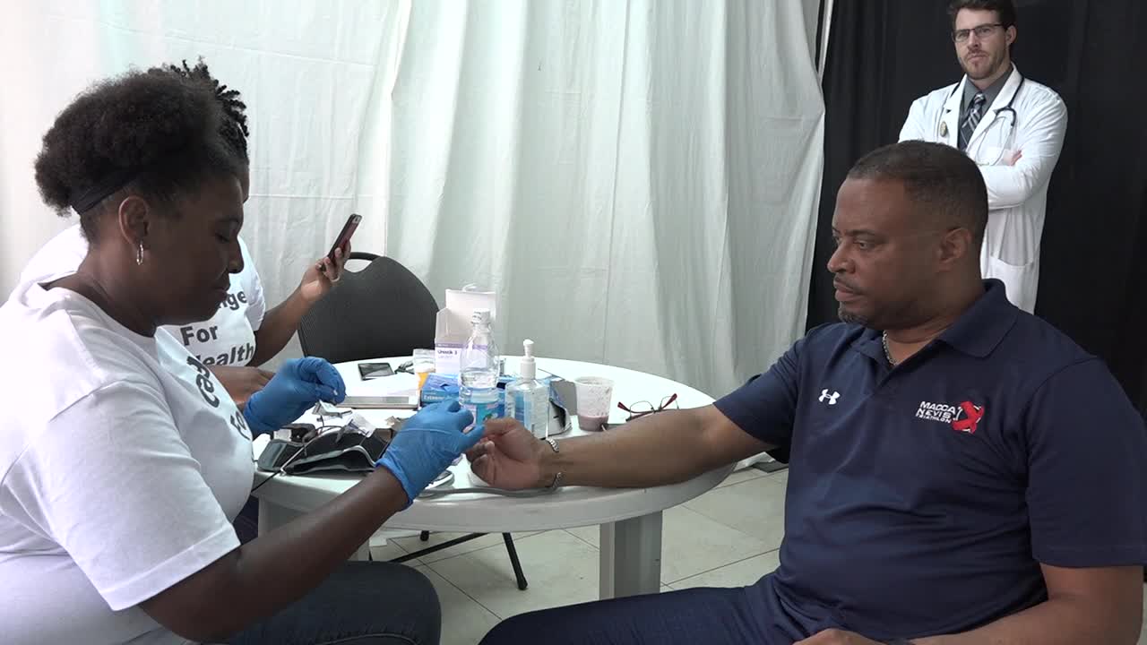 Hon. Mark Brantley, Deputy Premier of Nevis and Minister of Health getting to know his health status at the Barrels For Chance Inc. Health Fair at the St. Paul’s Anglican Church Hall in Charlestown on July 28, 2017