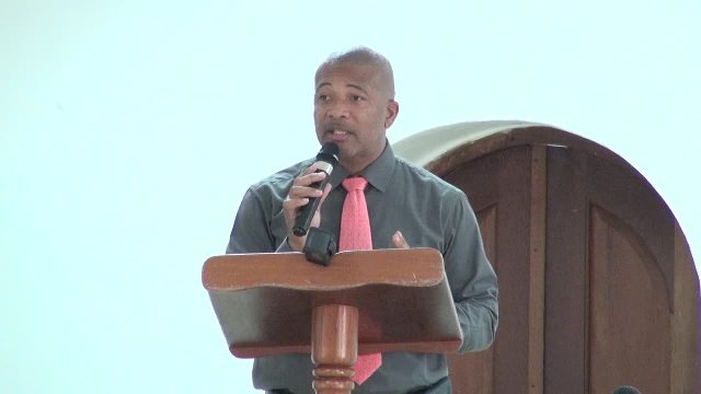 Hon. Spencer Brand, Minister of Labour, Public Works, Physical Planning, Posts and Environment in the Nevis Island Administration delivering remarks at a recent meeting at the St. Pauls Anglican Church Hall, with members of the Cabinet and Senior Civil Servants