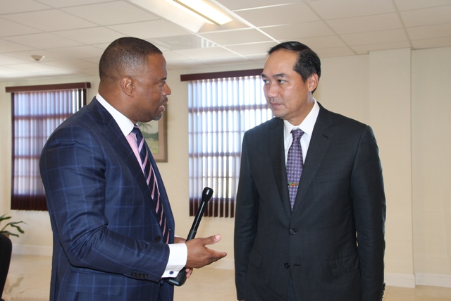 (l-r) Hon. Mark Brantley, Minister of Foreign Affairs in St. Kitts and Nevis and Premier of Nevis, and Special Envoy of the President of Indonesia His Excellency Muhammad Lutfi at the Premier’s office at Pinney’s Estate on March 02, 2018