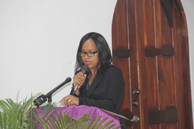 Mrs. Nicole Slack Liburd, Permanent Secretary in the Ministry of Health delivering a statement on behalf of Minister of Health and Gender Affairs on Nevis, at the Health is Wealth Seminar for Women and Girls at the St. Paul’s Anglican Church Hall hosted by the Department of Gender Affairs in observance of International Women’s Day and World Kidney Day on March 08, 2018