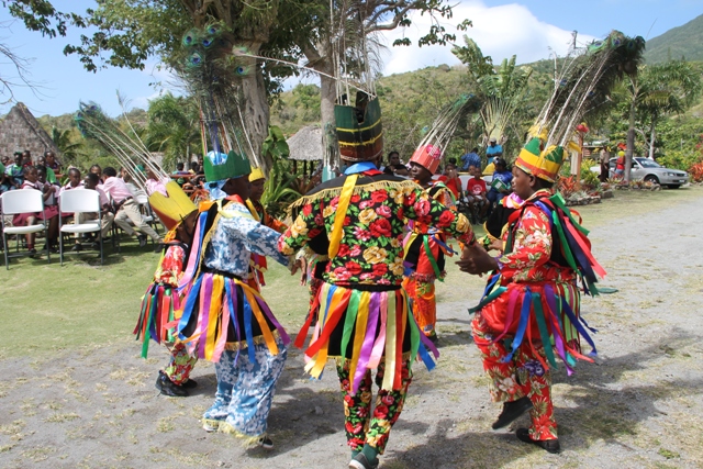 Primary school Masqueraders performing at the Nevisian Heritage Village at Fothergills in Gingerland