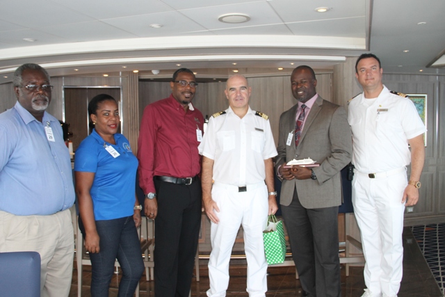 (L-R) Mr. Ken Pemberton, Port Manager in the Nevis Air and Sea Ports Authority, Ms. Tessa Manners, Representative from the Ministry of Tourism in the Nevis Island Administration, Mr. Devon Liburd, Director of Sales and Marketing at the Nevis Tourism Authority, Captain of the MV Silver Muse Marco Sangiscomo, Mr. Greg Phillip, Chief Executive Officer in the Nevis Tourism Authority and Mr. Jimmy Kovel, Cruise Director on the MV Silver Muse on board the ship docked in the Charlestown Port during its inaugural visit on April 06, 2018