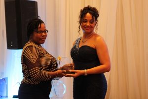 Ms. Stacy Parris, Front Desk and Reservation Supervisor at Oualie Beach Resort, receiving her award for the Ministry of Tourism’s Tourism Employee of the Year from First Lady Mrs. Sharon Brantley at the ministry’s Tourism Awards Gala and Dance at the Four Seasons Resort, Nevis on May 26, 2018
