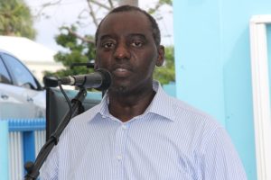 Mr. Timothy Prescott, Facilitator of a two-week Essential Oils Workshop, hosted by the Small Enterprise Development Unit in the Ministry of Finance on Nevis delivering remarks at the closing ceremony on May 23, 2018