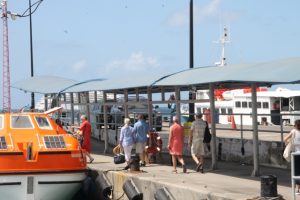 Tourists boarding a tender at the Charlestown Pier after their visit to Nevis during the 2018 Cruise Season (file photo)