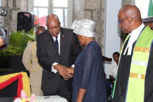 Governor General of St. Kitts and Nevis, Sir Tapley Seaton congrates Her Honour Hyleta Liburd, the new Deputy Governor General for Nevis after she was sworn in by Resident High Court Judge in St. Kitts Hon. Justin Trevor Ward QC (right) at the High Court in Charlestown on August 31, 2018