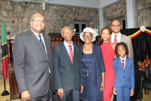 Her Honour Hyleta Liburd, new Deputy Governor General for Nevis, celebrates with her family and Governor General of St. Kitts and Nevis, Sir Tapley Seaton (extreme left) after she was sworn in at the High Court in Charlestown on August 31, 2018